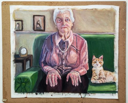 Oil painting of an elderly woman seated on a green sofa with a pearl necklace, a tabby cat beside her, framed pictures on the wall